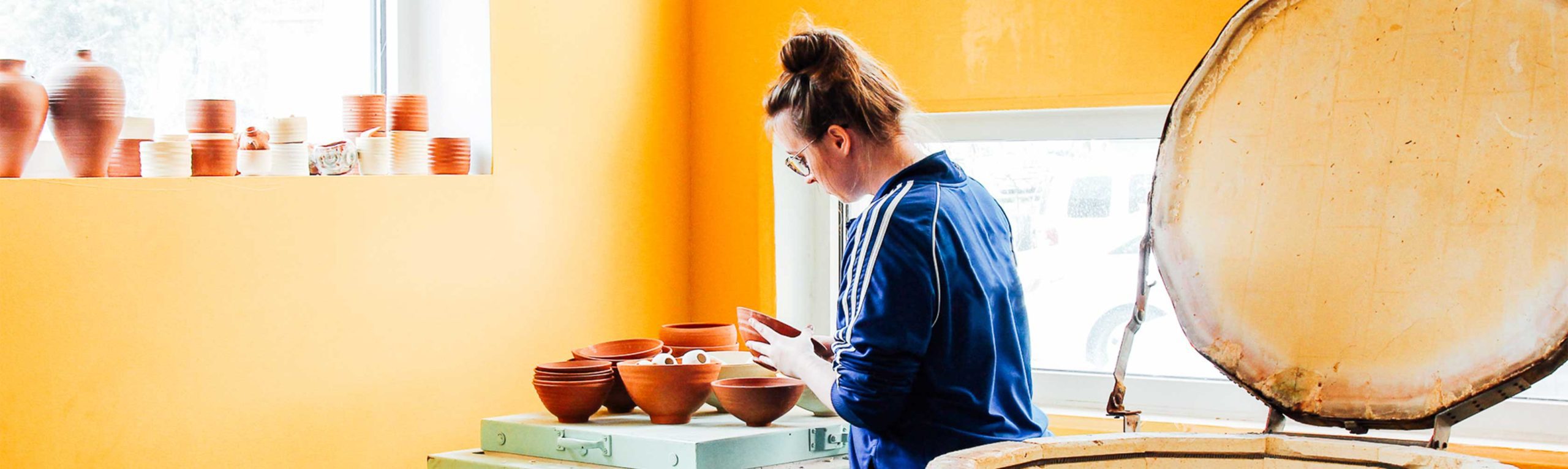 Student working in ceramics studio