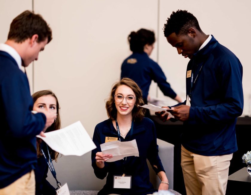 Student Smiling at a University leadership event