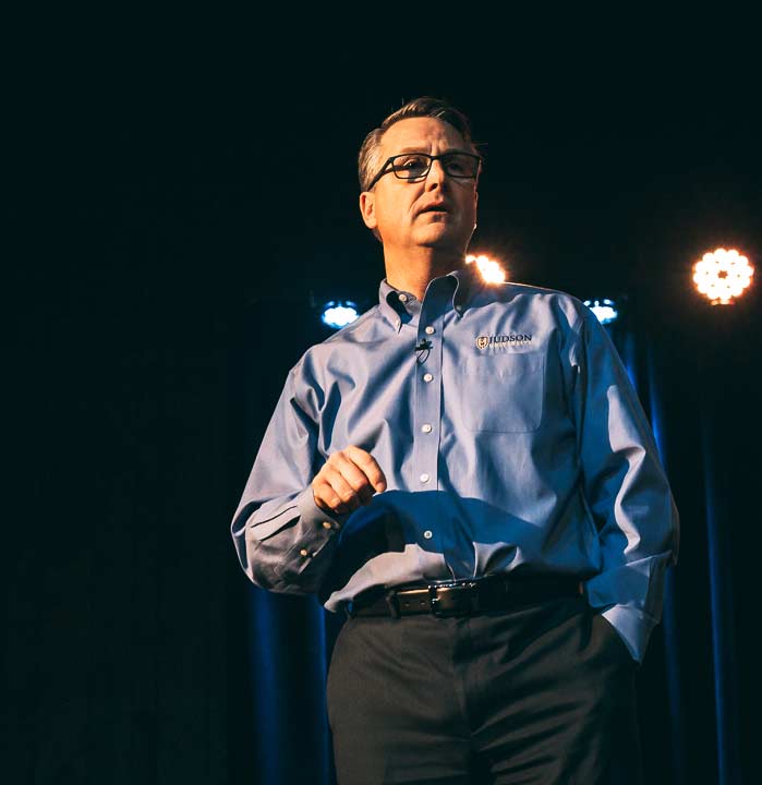 President Crume speaking on chapel stage