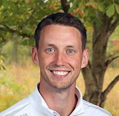 Smiling male alumni headshot