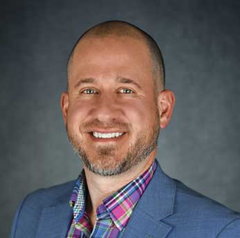 smiling male alumni headshot