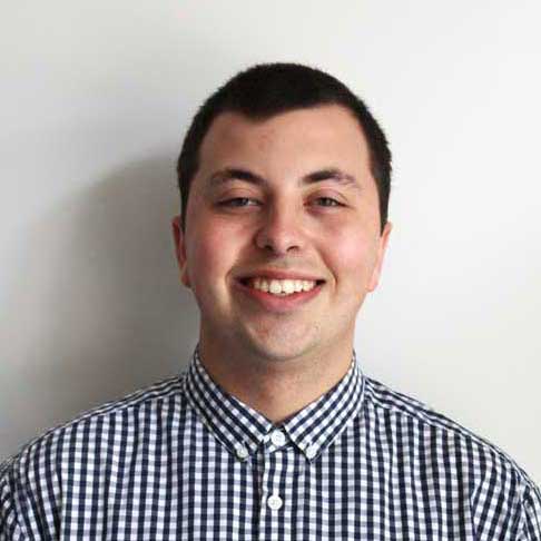 Smiling male alumni headshot