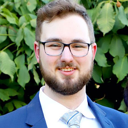 Smiling male alumni headshot