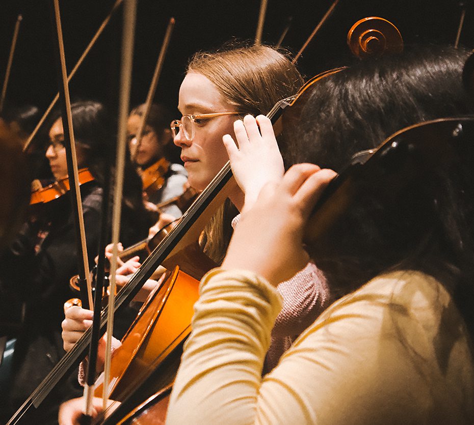 Orchestra students rehearsing