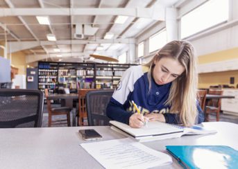 Student studying in Creekside South building