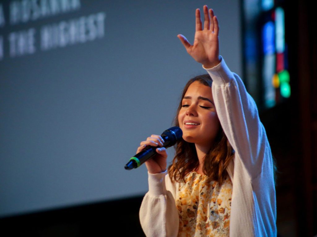 Young Woman in Worship